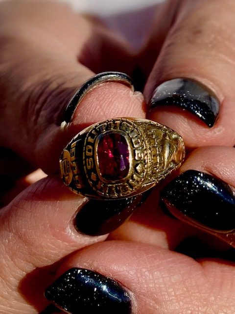 Norah Gonzales Costantino holds her Class of 1989 Southside High School class ring.