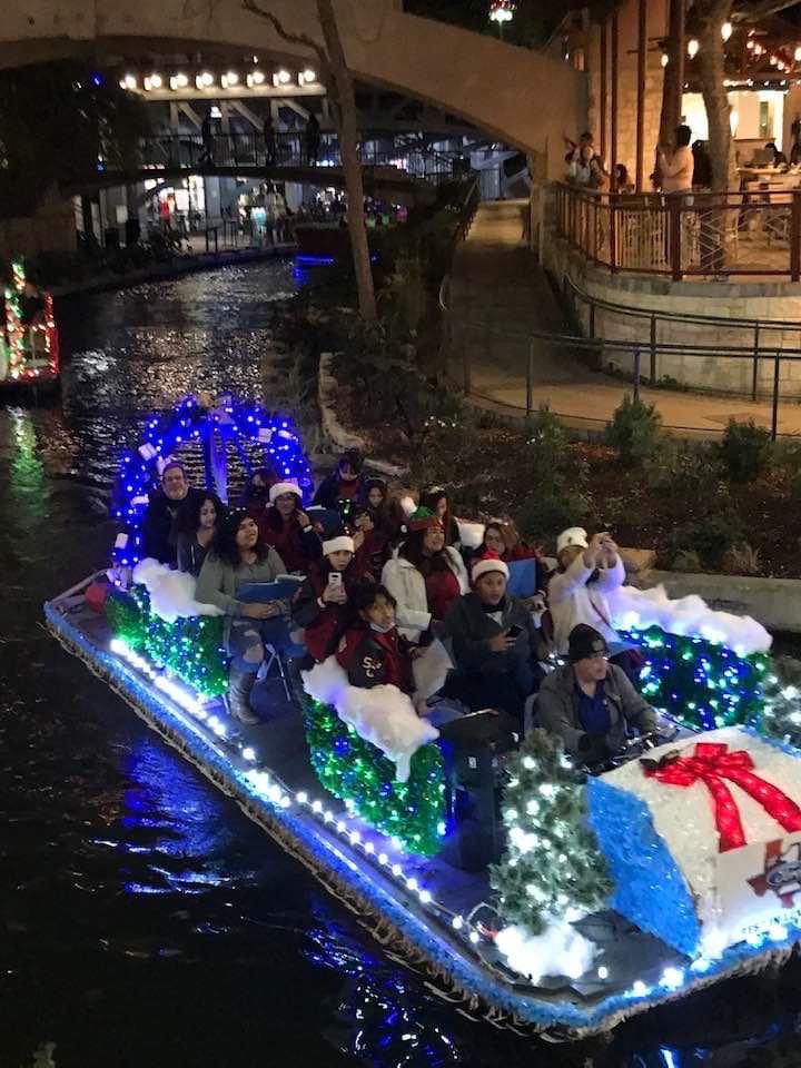 Southside High School Choir sing Christmas Carols on the San Antonio River downtown.